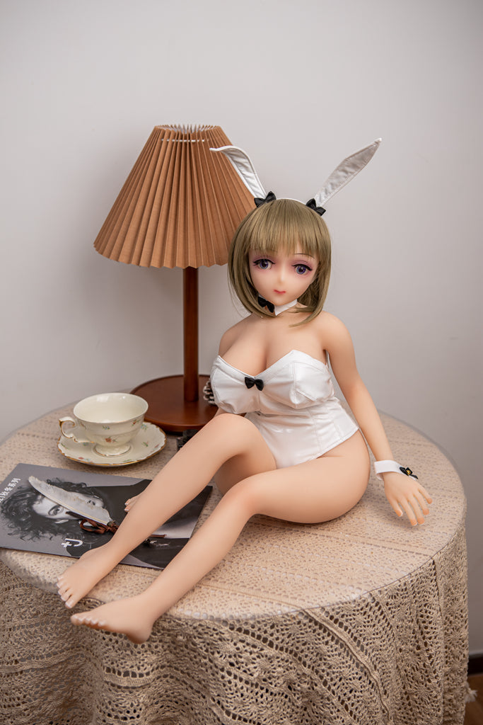 anime-love-doll-nude-lying-pose-bedroom-photography
