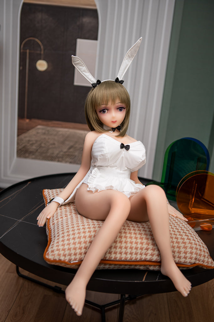 miniature-sex-doll-wearing-apron-in-bedroom